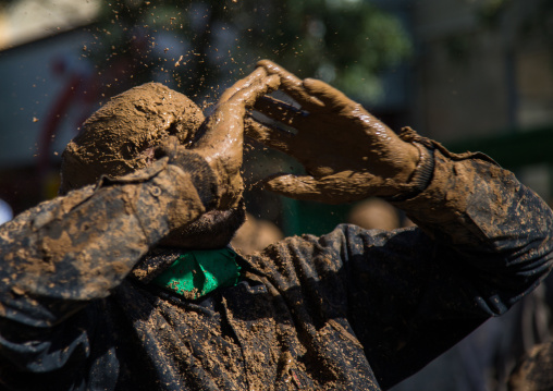 Iranian Shiite Muslim Man Covered In Mud, Chanting And Self-flagellating During Ashura Day, Kurdistan Province, Bijar, Iran