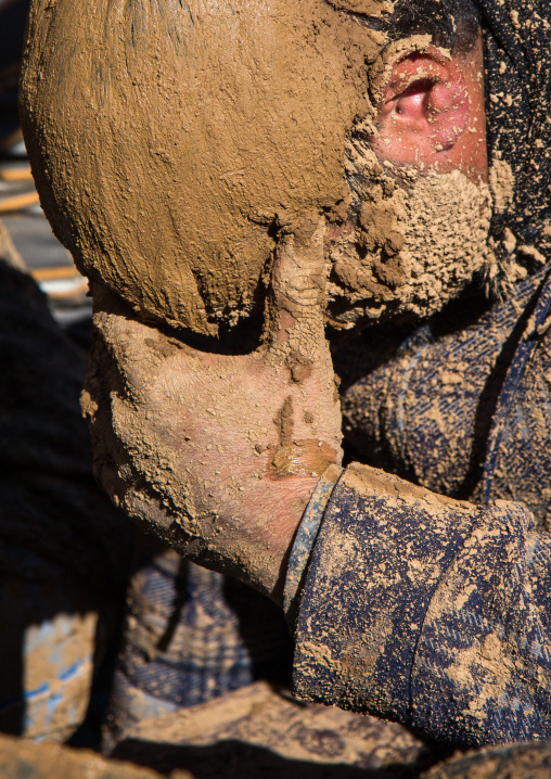 Iranian Shiite Muslim Man Covered In Mud Crying During Ashura Day, Kurdistan Province, Bijar, Iran