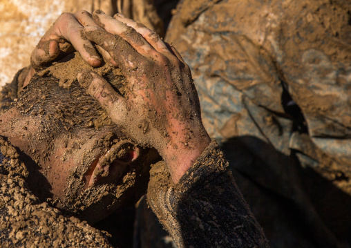 Iranian Shiite Muslim Man Covered In Mud, Chanting And Self-flagellating During Ashura Day, Kurdistan Province, Bijar, Iran