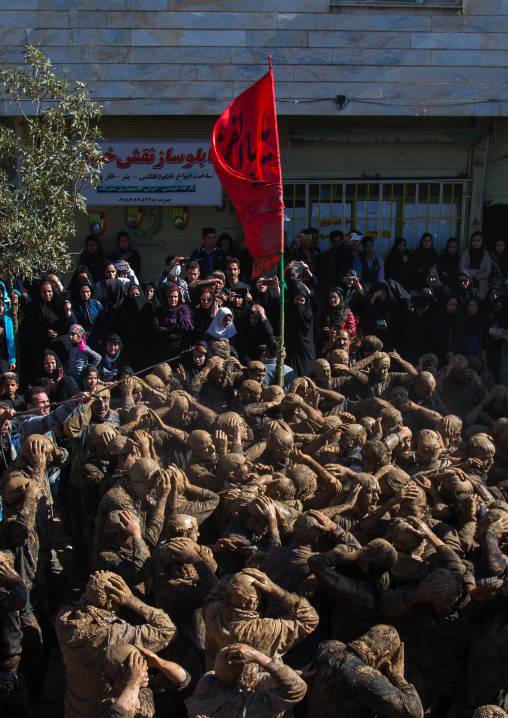 Iranian Shiite Muslim Men Covered In Mud, Chanting And Self-flagellating During Ashura, The Day Of The Death Of Imam Hussein, Kurdistan Province, Bijar, Iran