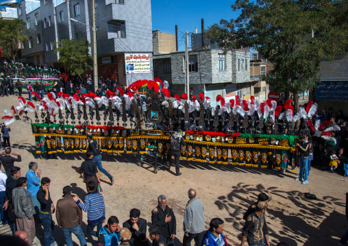 An Iranian Man Carries An Alam Is Helped By Shiite Muslim Mourners To Keep His Balance On Ashura, The Day Of The Death Of Hussein, Kurdistan Province, Bijar, Iran