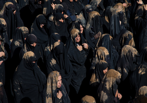 Iranian Shiite Muslim Women Covered In Mud, Chanting And Self-flagellating During Ashura, The Day Of The Death Of Imam Hussein, Kurdistan Province, Bijar, Iran