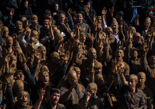 Iranian Shiite Muslim Men Covered In Mud, Chanting And Self-flagellating During Ashura, The Day Of The Death Of Imam Hussein, Kurdistan Province, Bijar, Iran