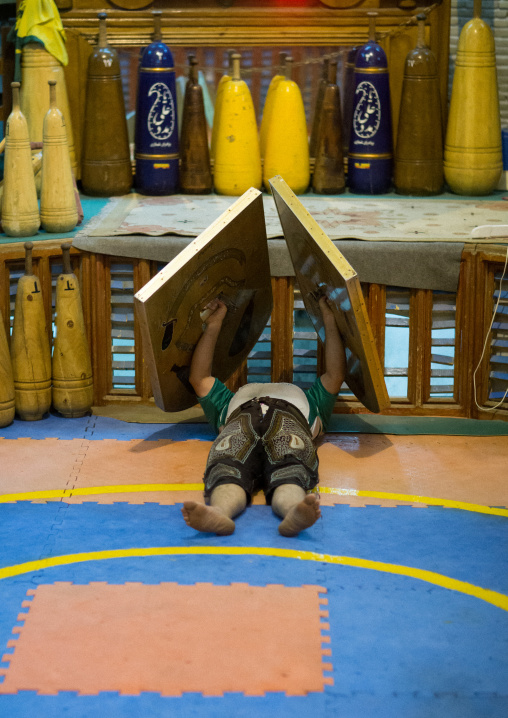 Iranian Man Training With Sangs In Saheb A Zaman Club Zurkhaneh, Yazd Province, Yazd, Iran