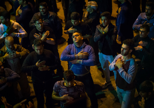 Iranian Shiite Muslim Men Chanting And Self-flagellating During Ashura, The Day Of The Death Of Imam Hussein, Golestan Province, Gorgan, Iran