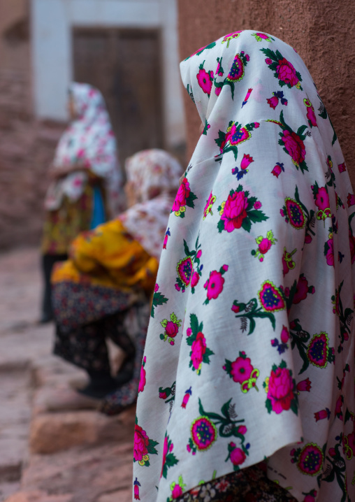 Portrait Of Iranian Women Wearing Traditional Floreal Chadors In Zoroastrian Village, Isfahan Province, Abyaneh, Iran