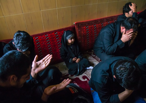 Little Girl In The Middle Of Shiite Muslim Mourners From The Mad Of Hussein Community Crying While Celebrating Muharram, Isfahan Province, Kashan, Iran