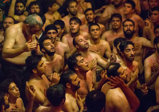 Iranian Shiite Muslim Mourners From The Mad Of Hussein Community Chanting And Self-flagellating During Muharram, Isfahan Province, Kashan, Iran