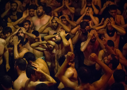 Iranian Shiite Muslim Mourners From The Mad Of Hussein Community Chanting And Self-flagellating During Muharram, Isfahan Province, Kashan, Iran