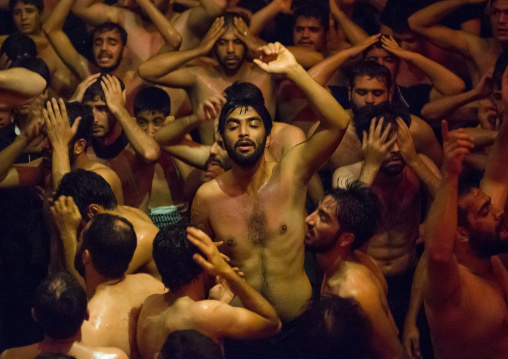 Iranian Shiite Muslim Mourners From The Mad Of Hussein Community Chanting And Self-flagellating During Muharram, Isfahan Province, Kashan, Iran