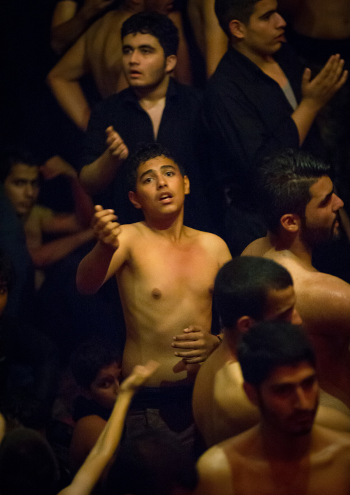 Iranian Shiite Muslim Mourners From The Mad Of Hussein Community Chanting And Self-flagellating During Muharram, Isfahan Province, Kashan, Iran