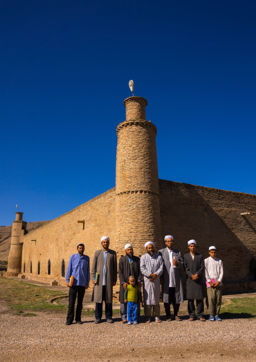 Iranian Shiite Men With A Child In Front Of An Old Caravanserai Turned Into Madrassah, Golestan Province, Karim Ishan, Iran