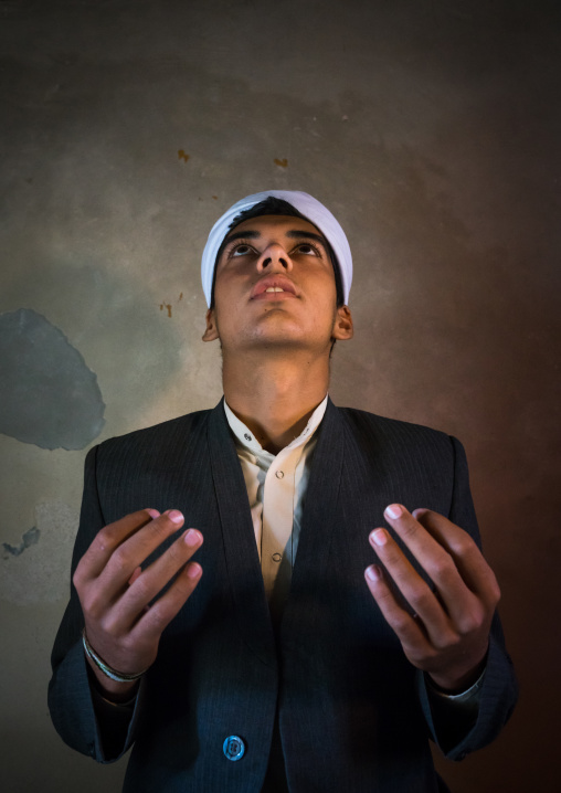 Iranian Shiite Muslim Student Praying In A Madrassah, Golestan Province, Karim Ishan, Iran