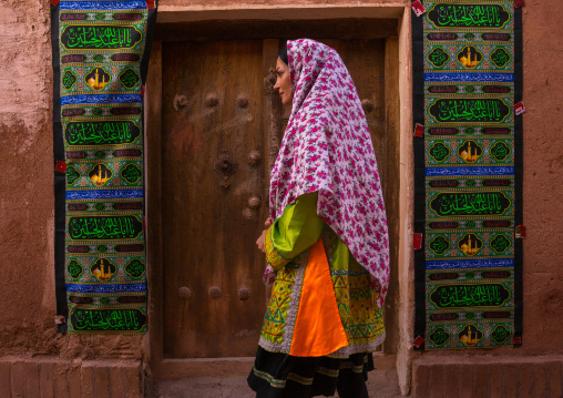 Portrait Of An Iranian Woman Wearing Traditional Floreal Chador In Zoroastrian Village, Isfahan Province, Abyaneh, Iran