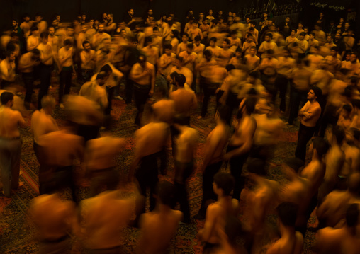 Iranian Shiite Muslim Mourners From The Mad Of Hussein Community Chanting And Self-flagellating In Circle During Muharram, Isfahan Province, Kashan, Iran