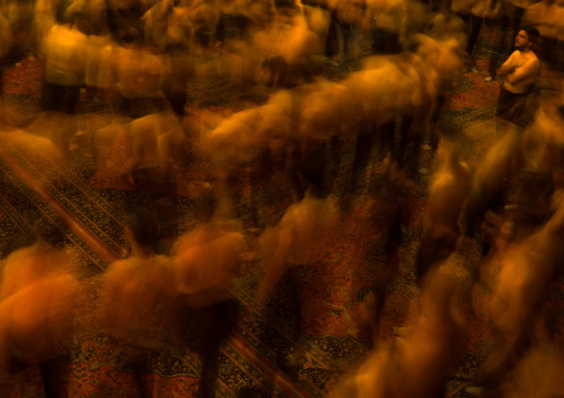 Iranian Shiite Muslim Mourners From The Mad Of Hussein Community Chanting And Self-flagellating In Circle During Muharram, Isfahan Province, Kashan, Iran