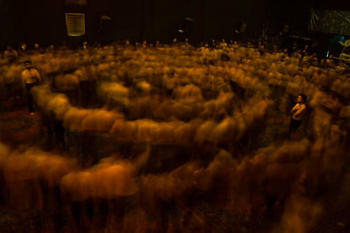 Iranian Shiite Muslim Mourners From The Mad Of Hussein Community Chanting And Self-flagellating In Circle During Muharram, Isfahan Province, Kashan, Iran