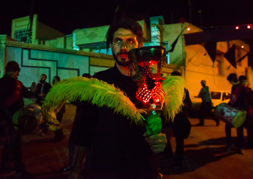 Iranian Shiite Muslim Man Holding An Incense Burner During Ashura, The Day Of The Death Of Imam Hussein, Isfahan Province, Kashan, Iran