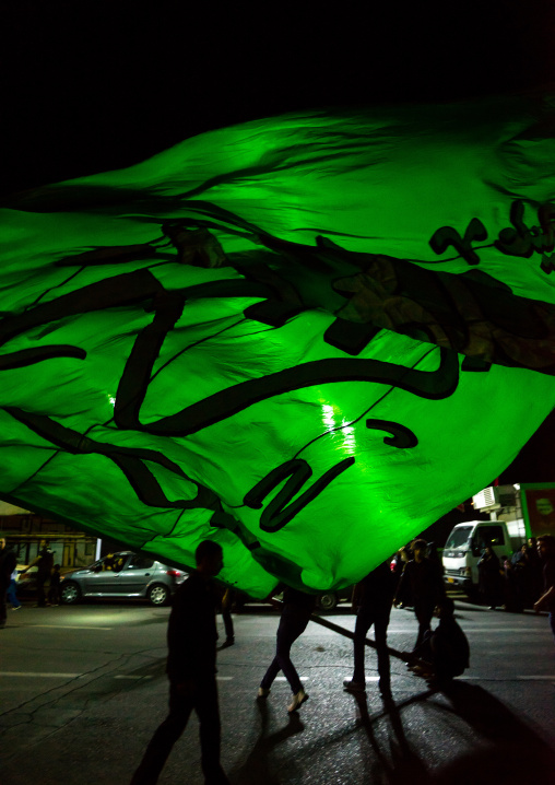 Iranian Shiite Muslims Men Parading With Green Flag During Ashura, The Day Of The Death Of Imam Hussein, Isfahan Province, Kashan, Iran