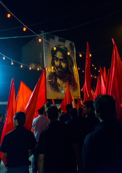 Iranian Shiite Muslims Men Parading With Red Flags During Ashura, The Day Of The Death Of Imam Hussein, Isfahan Province, Kashan, Iran