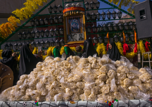 Candles For Sale In Front Of An Alam For Chehel Menbari Festival On Tasua To Commemorate The Martyrdom Anniversary Of Imam Hussein, Lorestan Province, Khorramabad, Iran