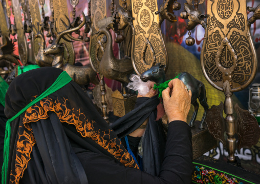 Iranian Shiite Women Putting Green Ribbons On An Alam To Make Wishes During Chehel Menbari Festival On Tasua Day, Lorestan Province, Khorramabad, Iran