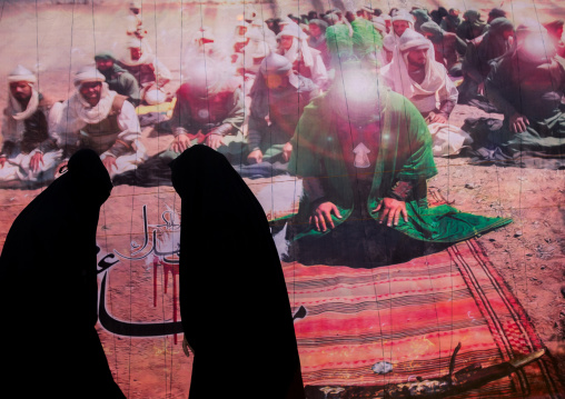 Iranian Shiite Women In Front Of A Banner Of Imam Hussein With Face Erased During Ashura Celebration, The Day Of The Death Of Hussein, Lorestan Province, Khorramabad, Iran