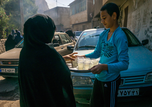 Iranian Shiite Muslims Man Serving Nazri Tea Distributed Freely To Mourners During Muharram, Lorestan Province, Khorramabad, Iran