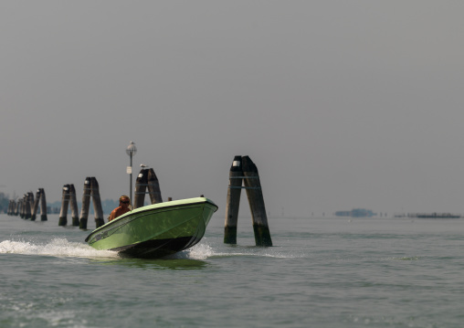 Motorboat sailing on grand canal, Veneto Region, Venice, Italy