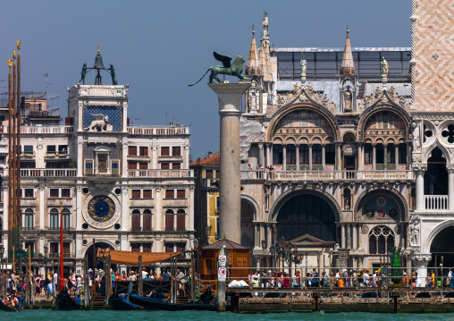 The lion of venice ancient bronze winged lion sculpture in the piazza san marco, Veneto Region, Venice, Italy