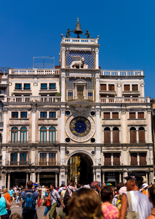 St Mark clock tower against sky, Veneto Region, Venice, Italy