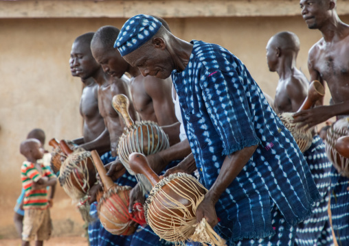 Musicians with shakers performing during a Goli sacred mask dance in Baule tribe, Région des Lacs, Bomizanbo, Ivory Coast