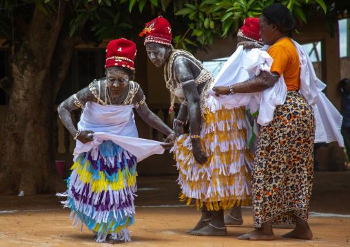 Women dancing during a ceremony in Adjoua Messouma Komians initiation centre, Moyen-Comoé, Aniassue, Ivory Coast