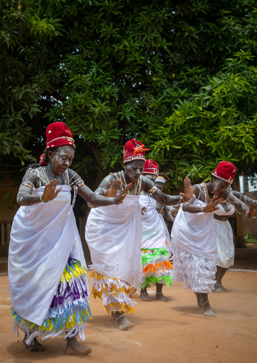 Women dancing during a ceremony in Adjoua Messouma Komians initiation centre, Moyen-Comoé, Aniassue, Ivory Coast