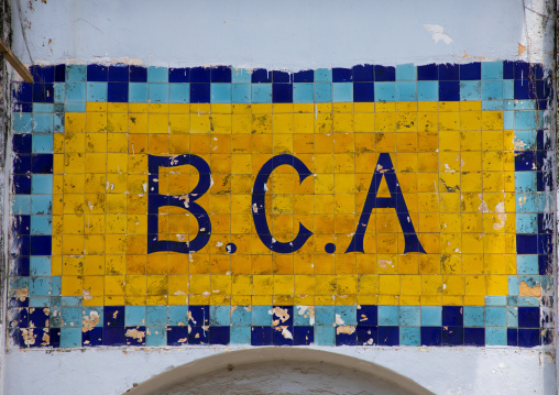 Mosaic on an old french colonial building which was the former Banque Centrale Africaine in the UNESCO world heritage area, Sud-Comoé, Grand-Bassam, Ivory Coast