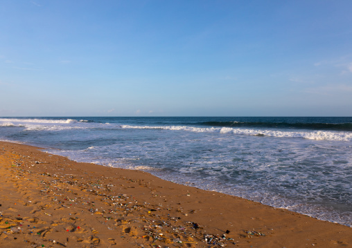 Garbage on an empty beach, Sud-Comoé, Grand-Bassam, Ivory Coast