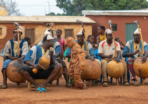 African musicians playing koras during Boloye dance of the panther man, Savanes district, Waraniene, Ivory Coast