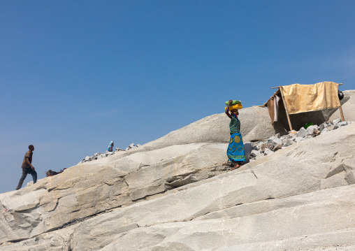 African people working in a granite quarry, Savanes district, Shienlow, Ivory Coast