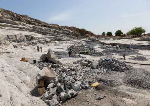 African people working in a granite quarry, Savanes district, Shienlow, Ivory Coast