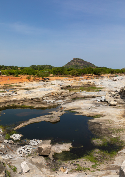 African people working in a granite quarry, Savanes district, Shienlow, Ivory Coast