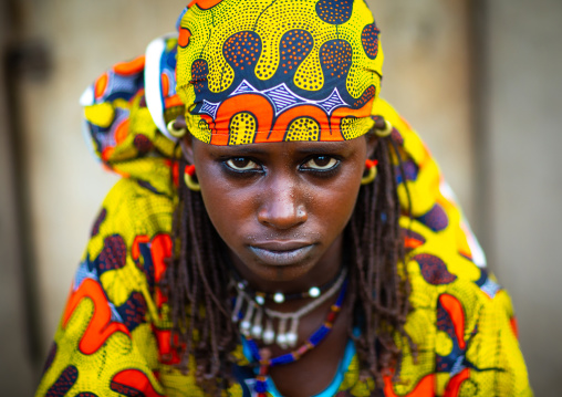 Portrait of a Peul tribe young woman with colorful clothes, Savanes district, Boundiali, Ivory Coast