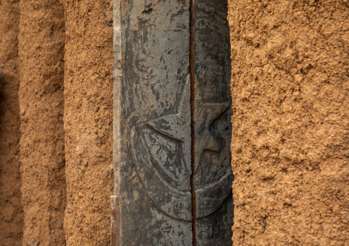 Wooden window of the 17th century sudano-sahelian mosque, Savanes district, Kouto, Ivory Coast