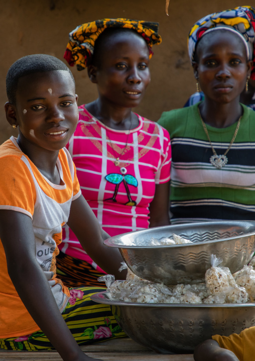 African girl and woman in a market, Bafing, Gboni, Ivory Coast