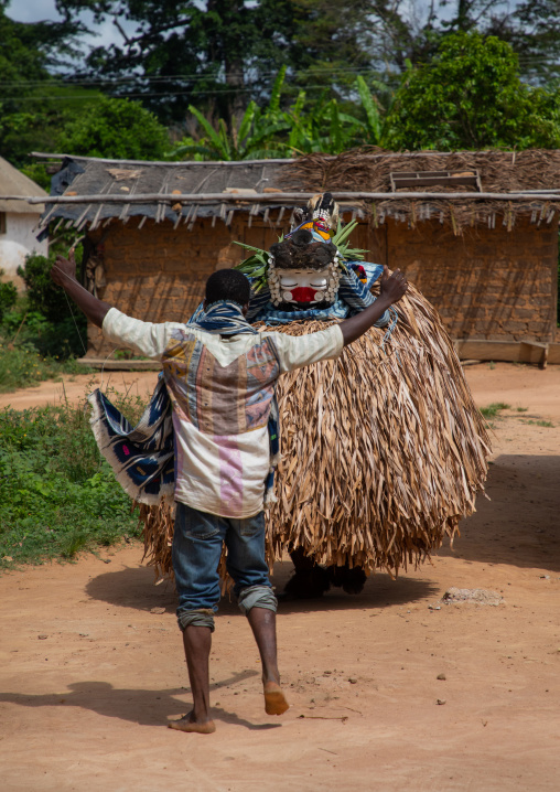 We Guere sacred mask dance during a ceremony, Guémon, Bangolo, Ivory Coast