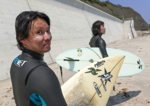 Japanese surfers in the contaminated area after the daiichi nuclear power plant irradiation, Fukushima prefecture, Tairatoyoma beach, Japan