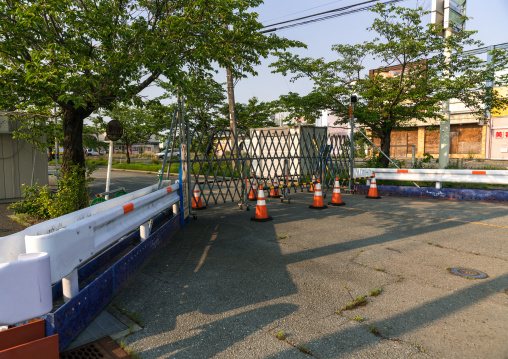 Roadblock in the difficult-to-return zoneafter the daiichi nuclear power plant irradiation, Fukushima prefecture, Tomioka, Japan