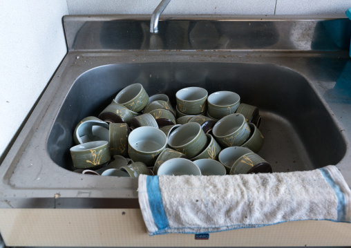 Kitchen in an abandoned house in the difficult-to-return zone after the daiichi nuclear power plant irradiation, Fukushima prefecture, Tomioka, Japan