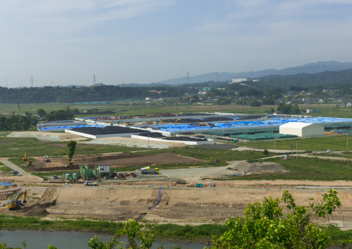 Bags containing irradiated debris are stacked in an area that was affected by the 2011 tsunami and nuclear disaster, Fukushima prefecture, Naraha, Japan