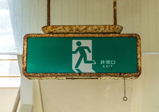 Rxit sign in a devastated house in the highly contaminated area after the daiichi nuclear power plant irradiation and the tsunami, Fukushima prefecture, Futaba, Japan