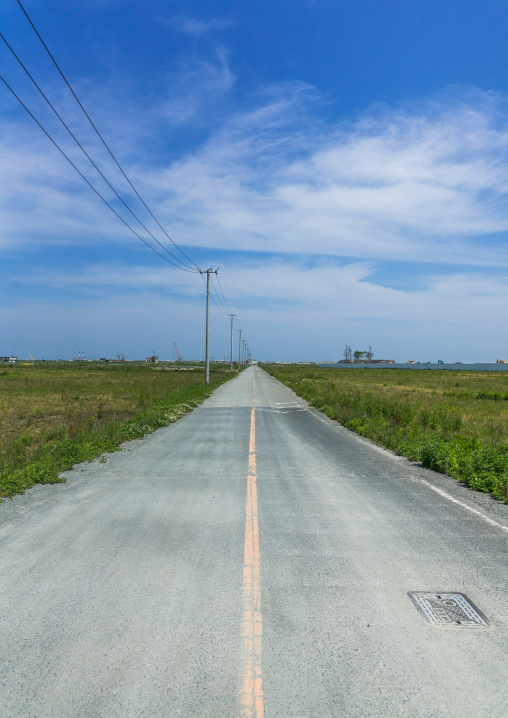 Road leading to the houses destroyed by the earthquake and the tsunami of 2011, Fukushima prefecture, Namie, Japan